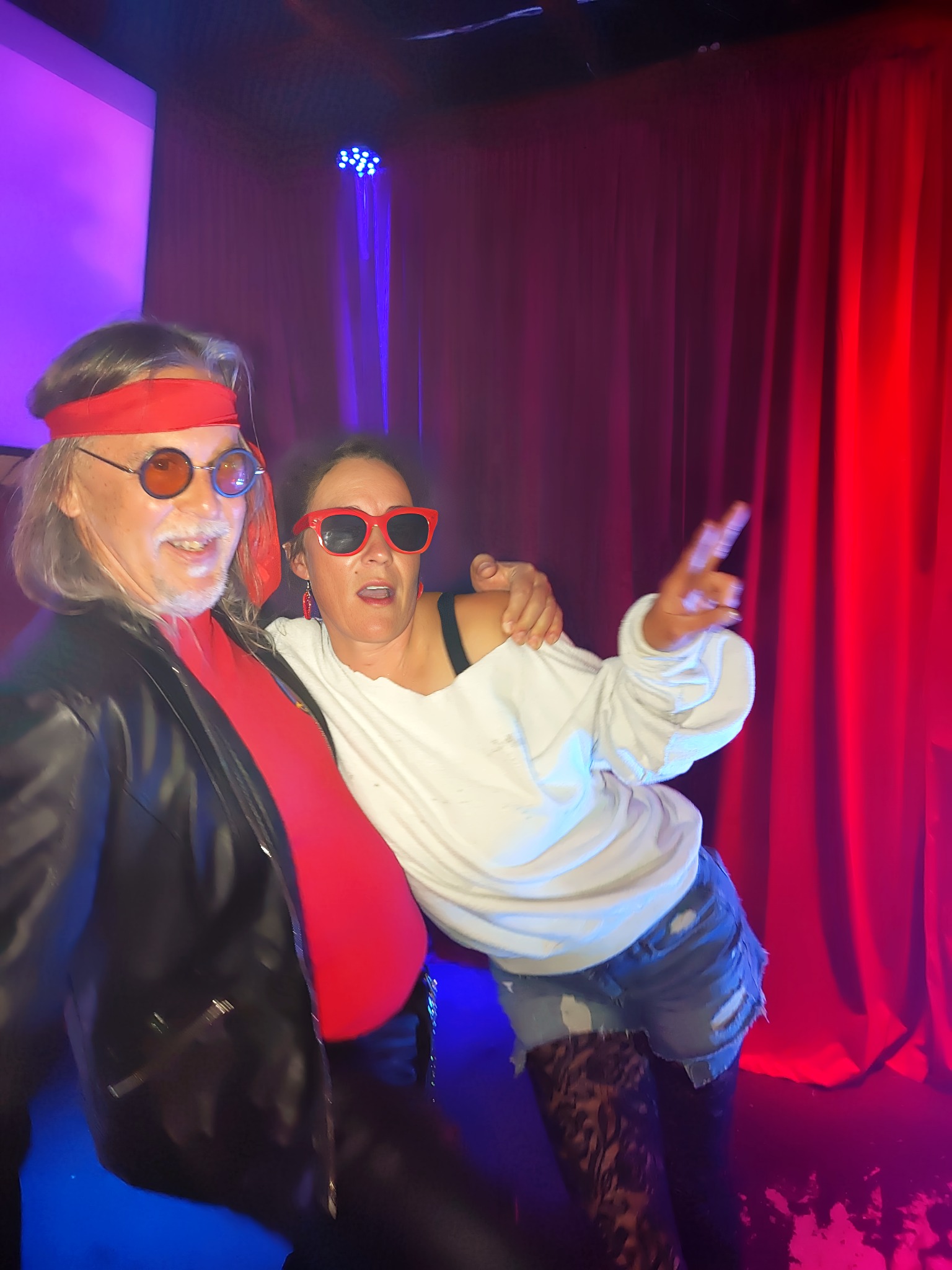 The two sloKaraoke hosts together at an event