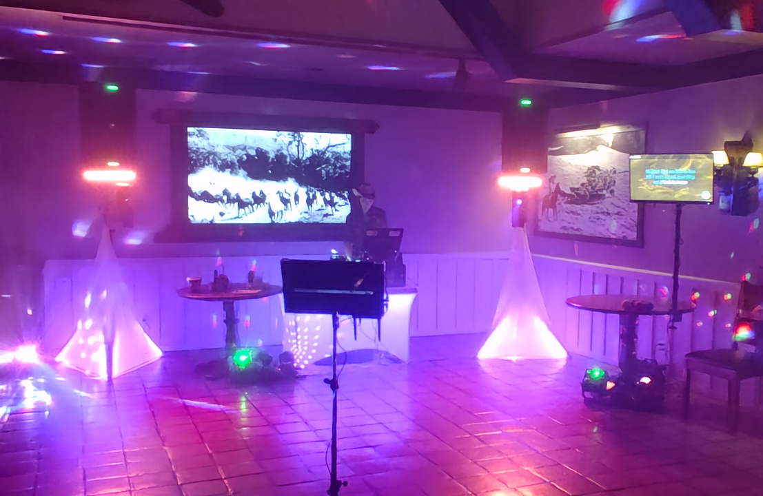 sloKaraoke lighting and karaoke setup prepared for a wedding reception